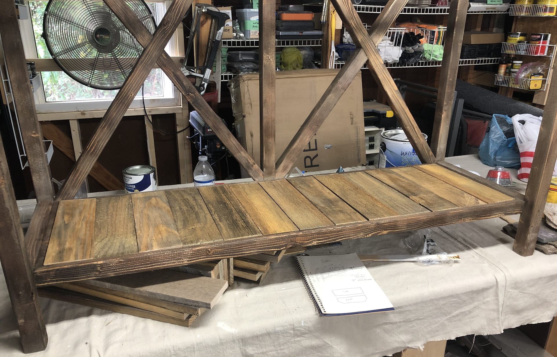 Stained X-frame console with wood slat shelf