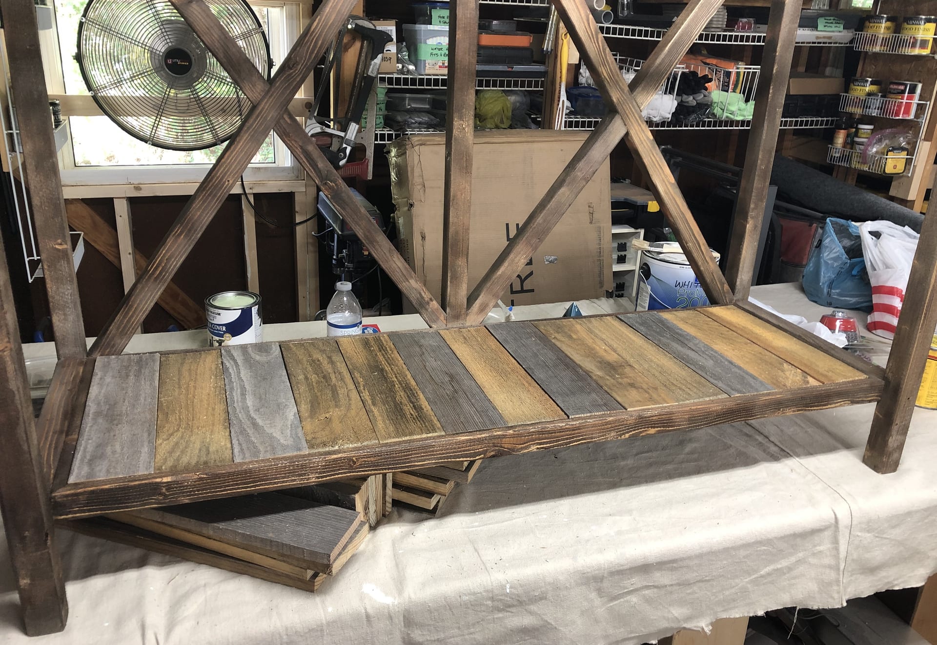 Side view of stained X-frame console