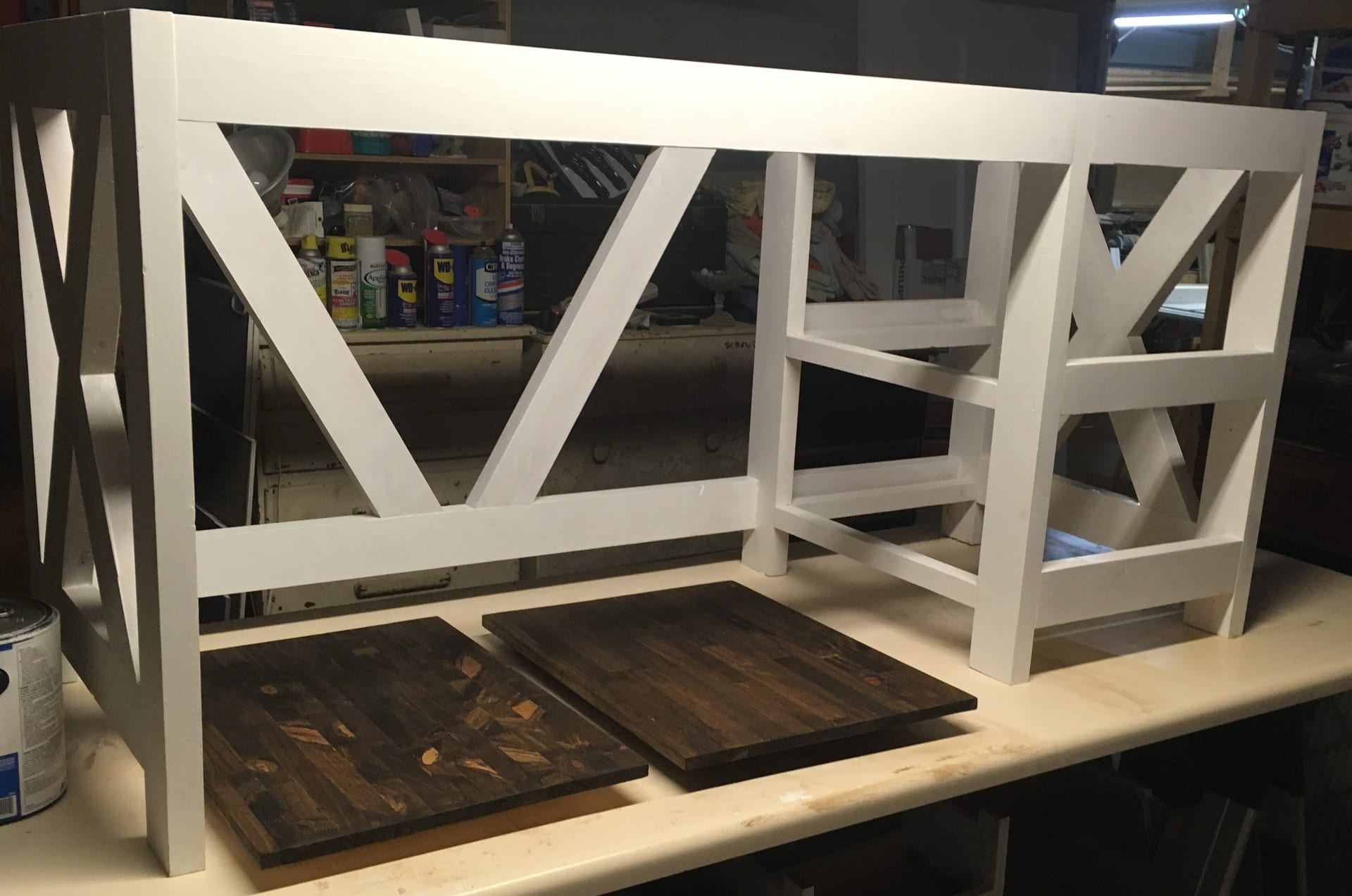 White X-frame console with dark wood inserts